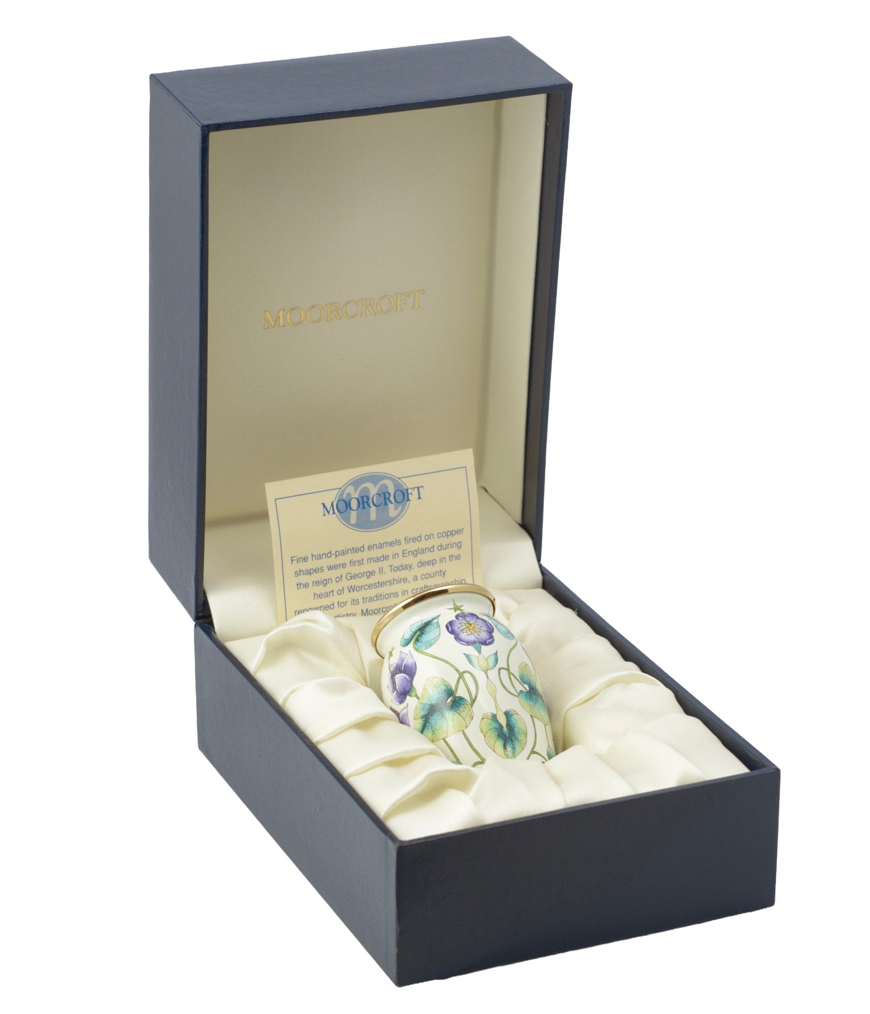 Moorcroft Enamels miniature vase beside original blue presentation box, sweet pea design, 2000