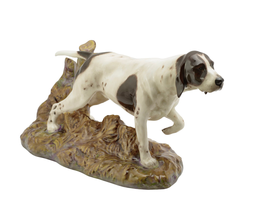 Royal Doulton Pointer dog figure HN2624 - three quarter rear view showing moulded fallen leaves and tree stump base