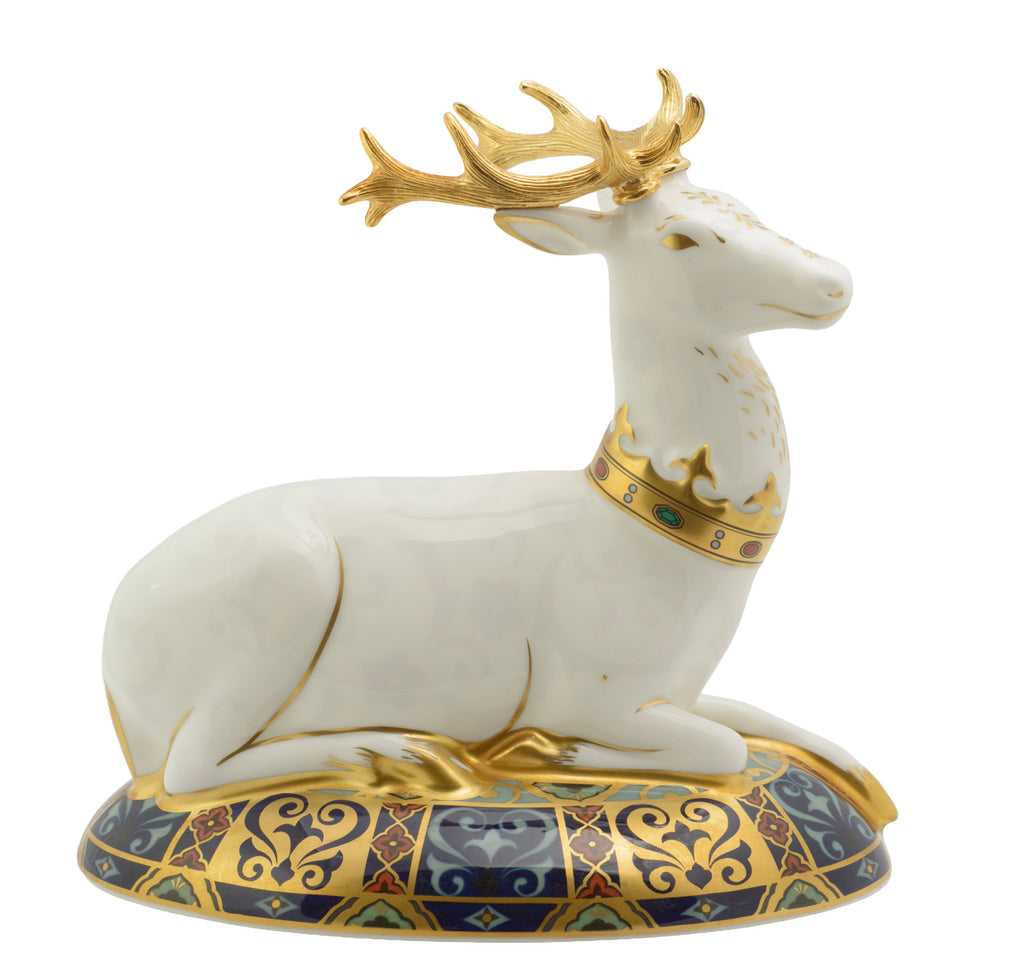 Royal Crown Derby The White Hart paperweight - three quarter view showing gilded crown collar and heraldic oval base