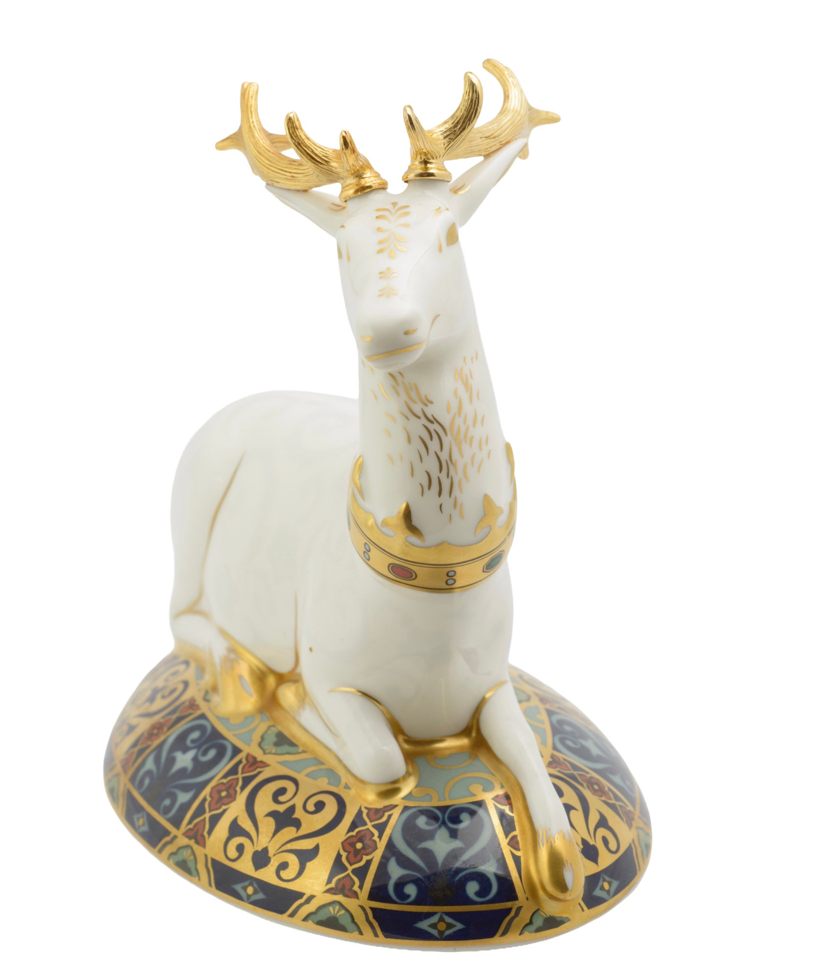 Royal Crown Derby The White Hart paperweight - side view showing recumbent white stag and elaborate heraldic base