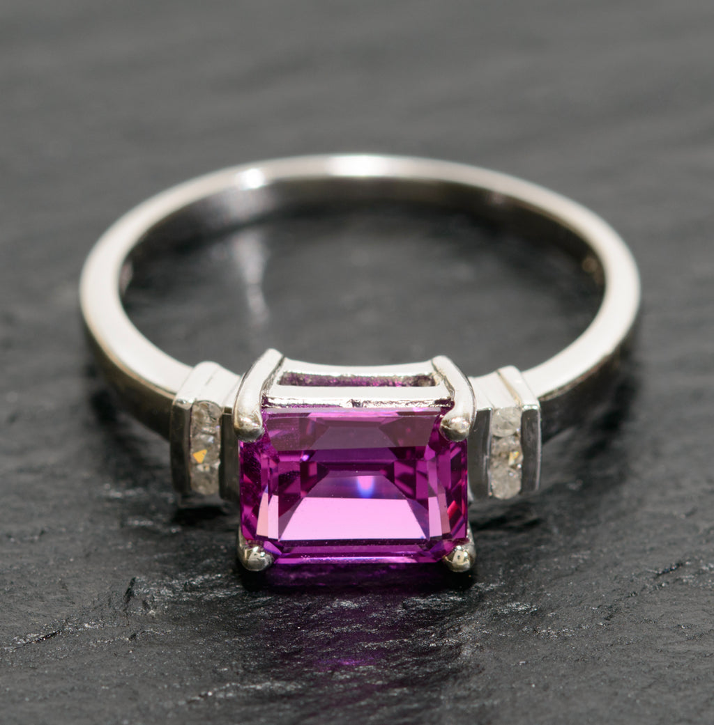 10K White Gold & Emerald Cut Pink Sapphire Ring With Diamond Accents UK Size O (A1738)