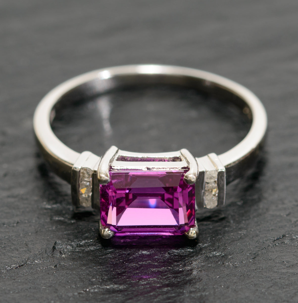 10K White Gold & Emerald Cut Pink Sapphire Ring With Diamond Accents UK Size O (A1738)