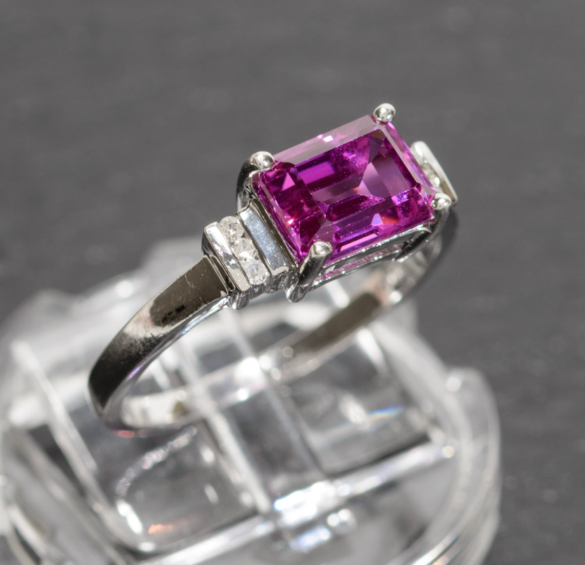 10K White Gold & Emerald Cut Pink Sapphire Ring With Diamond Accents UK Size O (A1738)