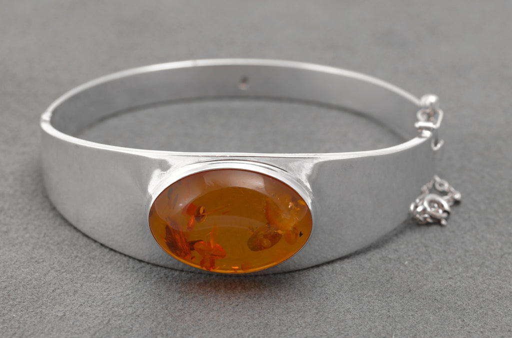 Vintage Sterling Silver and Amber Bangle - amber cabochon close-up showing natural inclusions