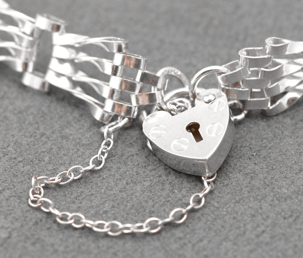 Vintage Sterling Silver Gate Bracelet - close-up of heart padlock clasp and safety chain detail