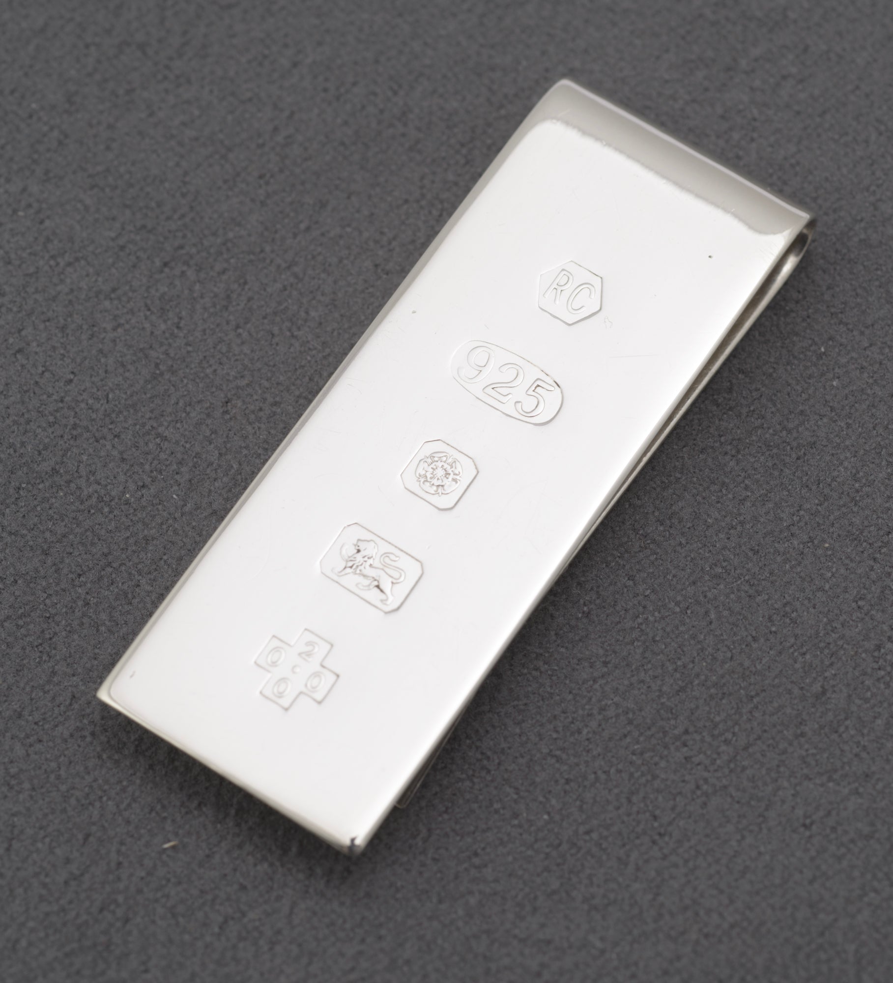 Sterling silver money clip by Carr's of Sheffield - hallmark face showing RC maker's mark, 925, Sheffield assay and Millennium marks