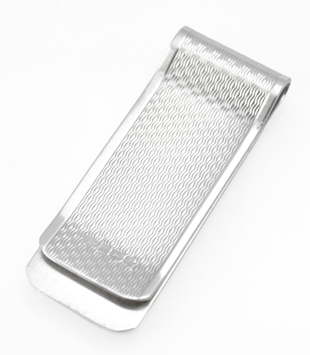 Vintage Sterling Silver Engine Turned Money Clip - three-quarter view showing engine turned surface and polished borders