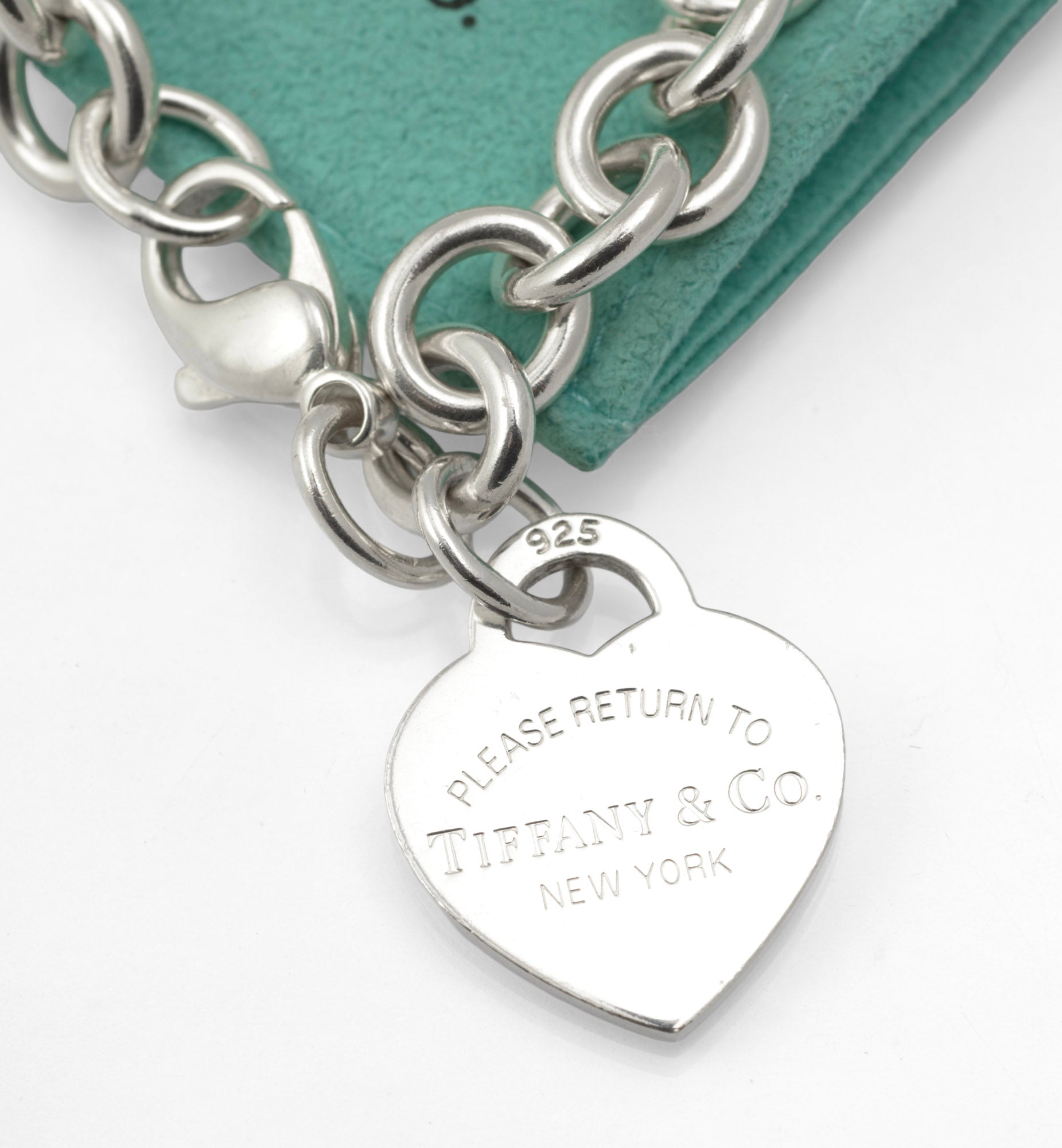 Tiffany & Co Return to Tiffany Sterling Silver Heart Tag Bracelet - close-up of heart tag showing Please Return to Tiffany & Co New York inscription and 925 mark