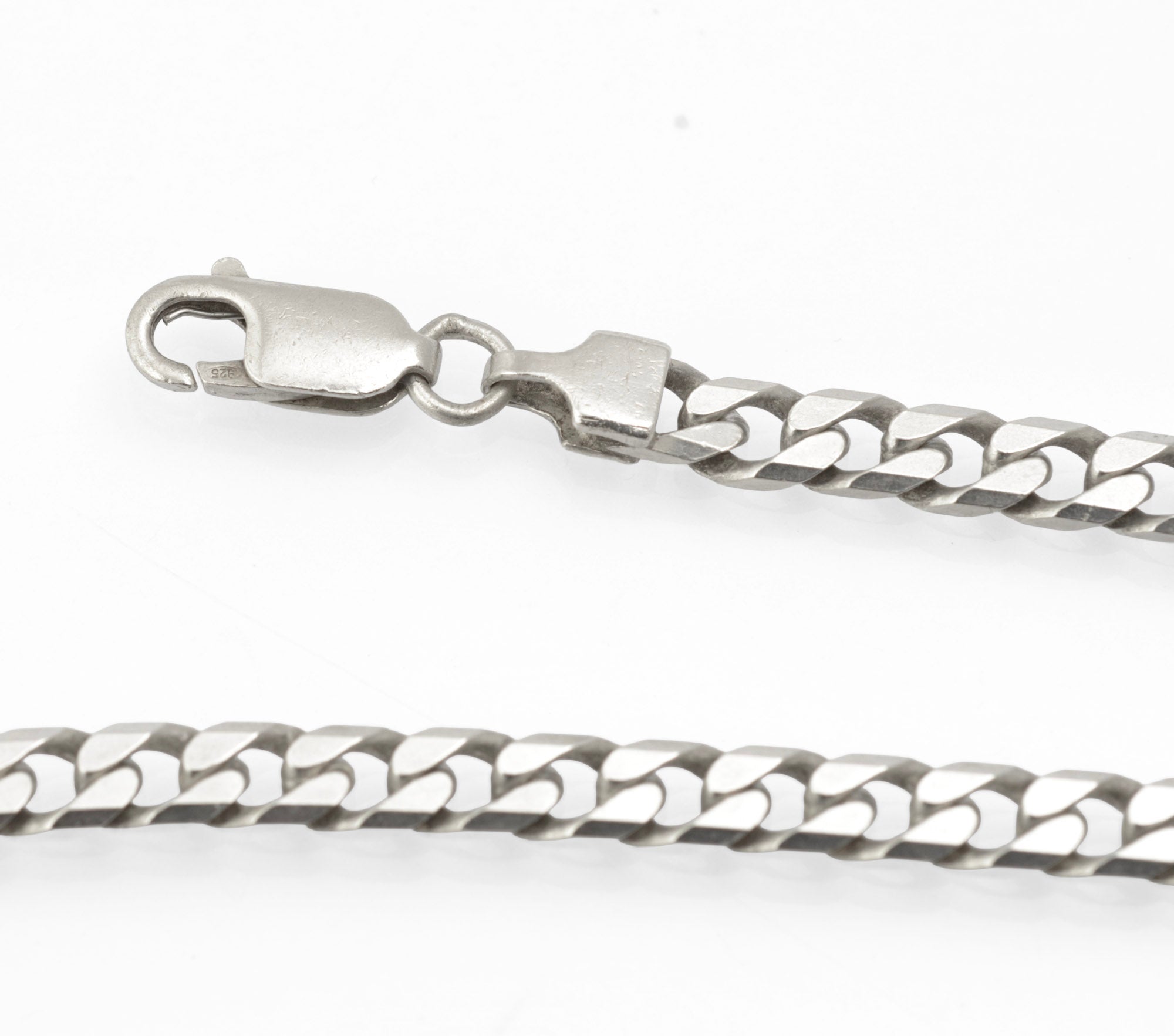 Vintage Sterling Silver Curb Chain Necklace - IBB - chain looped on grey background