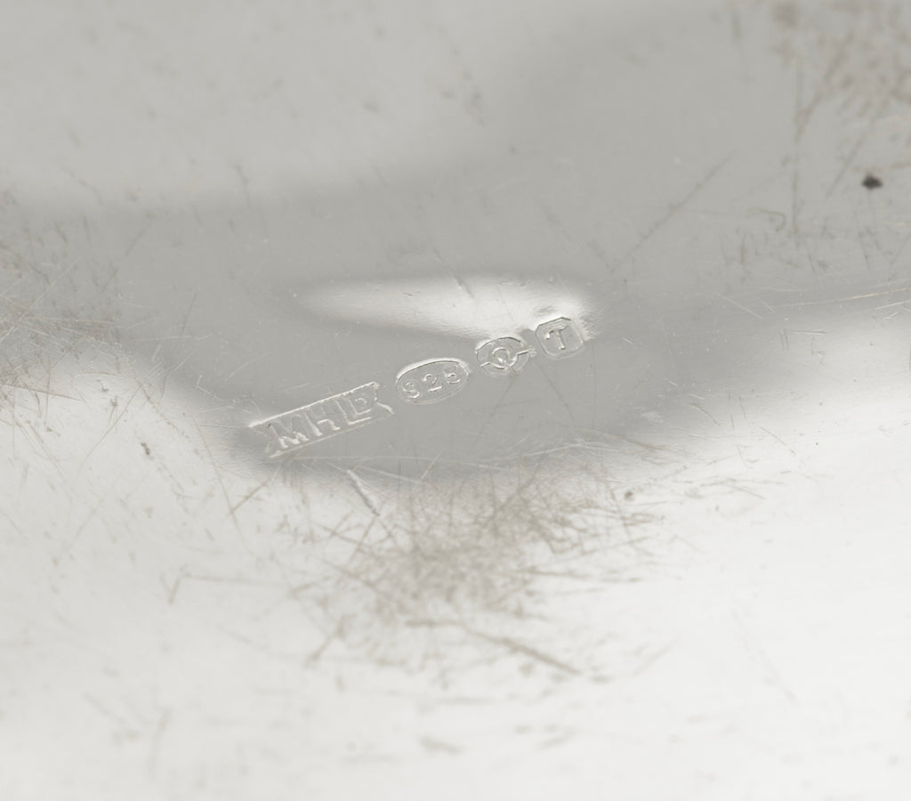 Vintage sterling silver heart shaped trinket box - top view showing plain polished centre and engraved border