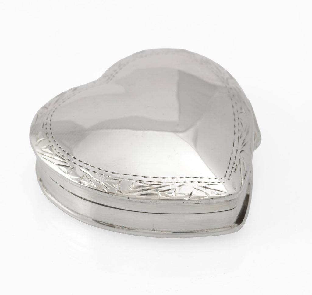 Vintage sterling silver heart shaped trinket box - angled view showing lid and base construction