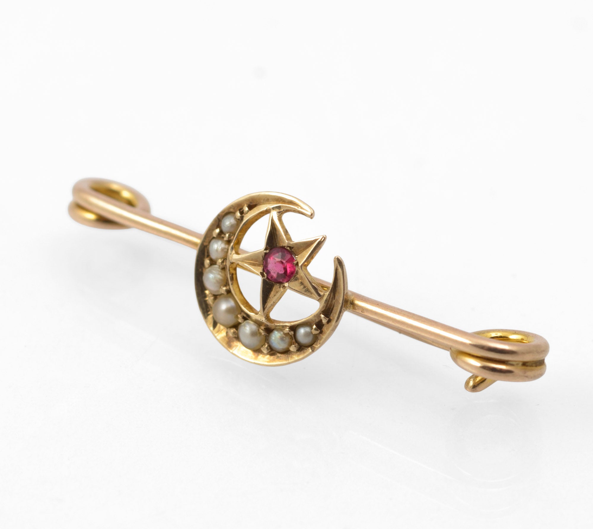 Antique Victorian 9ct gold honeymoon brooch - side view showing bar form with loop terminals and crescent mount