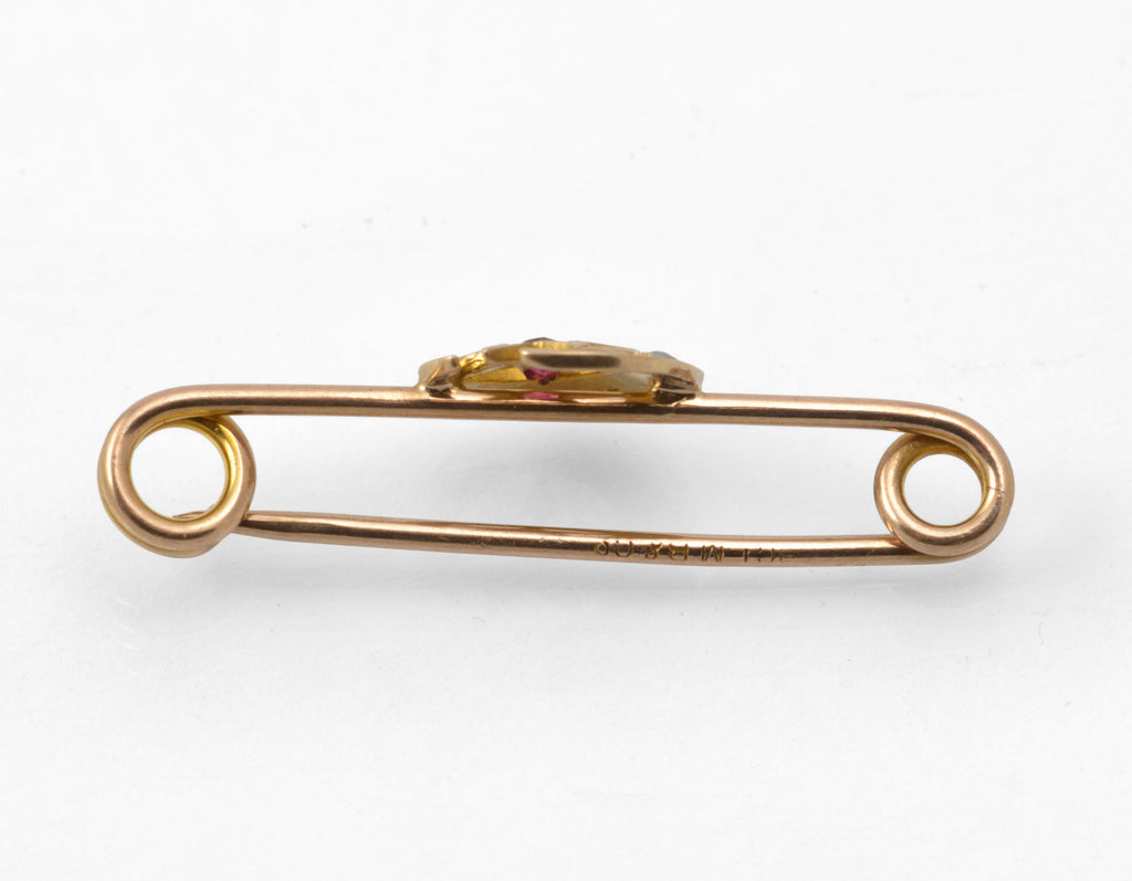 Antique Victorian 9ct gold honeymoon brooch - close-up of crescent moon with graduated split pearls and red paste star