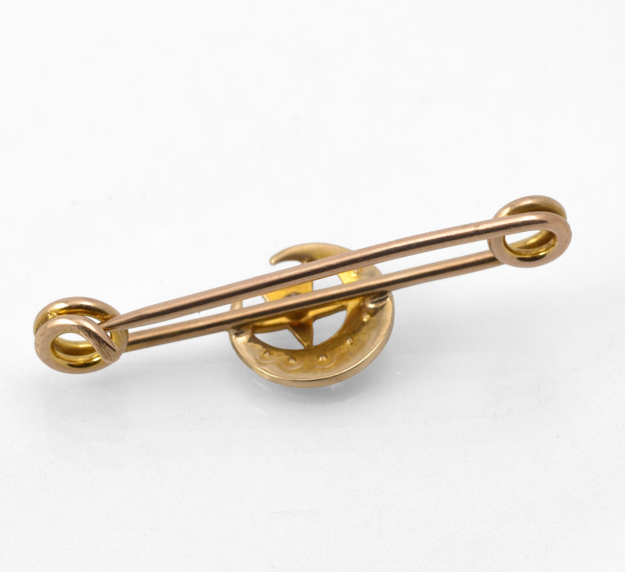 Antique Victorian 9ct gold honeymoon brooch - scale reference showing brooch beside a five pence coin