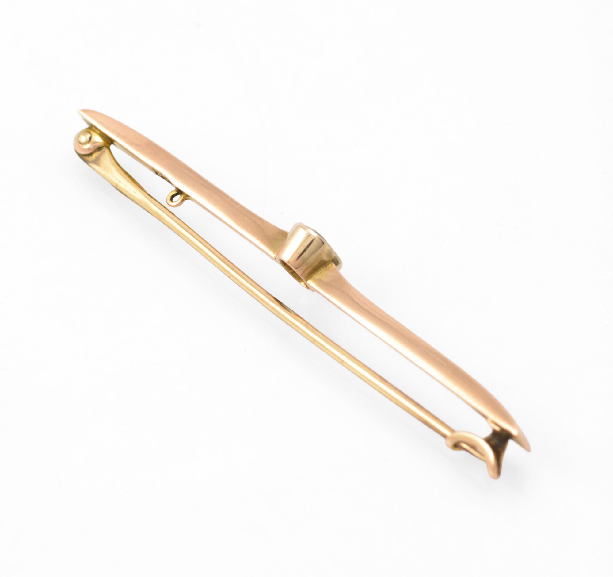 Art Deco 9ct rose gold aquamarine bar brooch - reverse three-quarter view showing pin mechanism and collet back