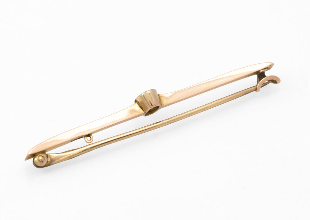 Art Deco 9ct rose gold aquamarine bar brooch - reverse angled view with pin extended showing C-clasp and safety loop detail