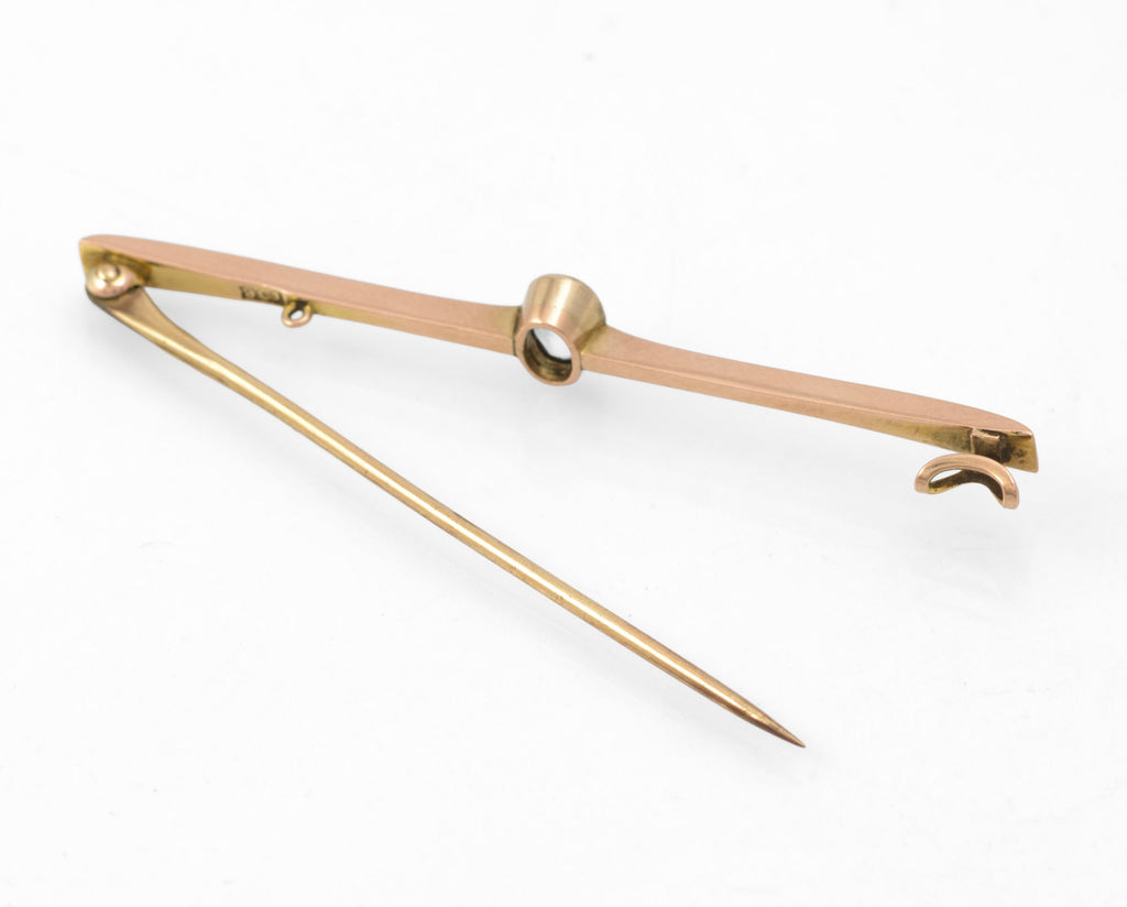 Art Deco 9ct rose gold aquamarine bar brooch - close-up of hallmark showing 9ct mark struck to reverse of bar