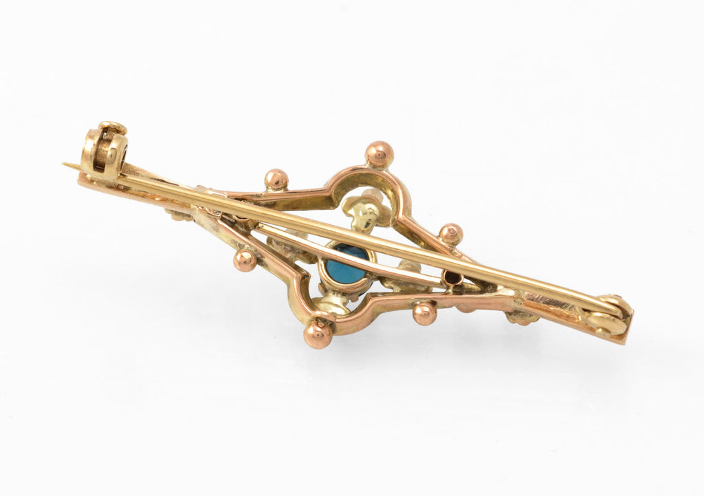 Antique 9ct gold bar brooch - reverse three-quarter view showing pin extended and safety clasp mechanism
