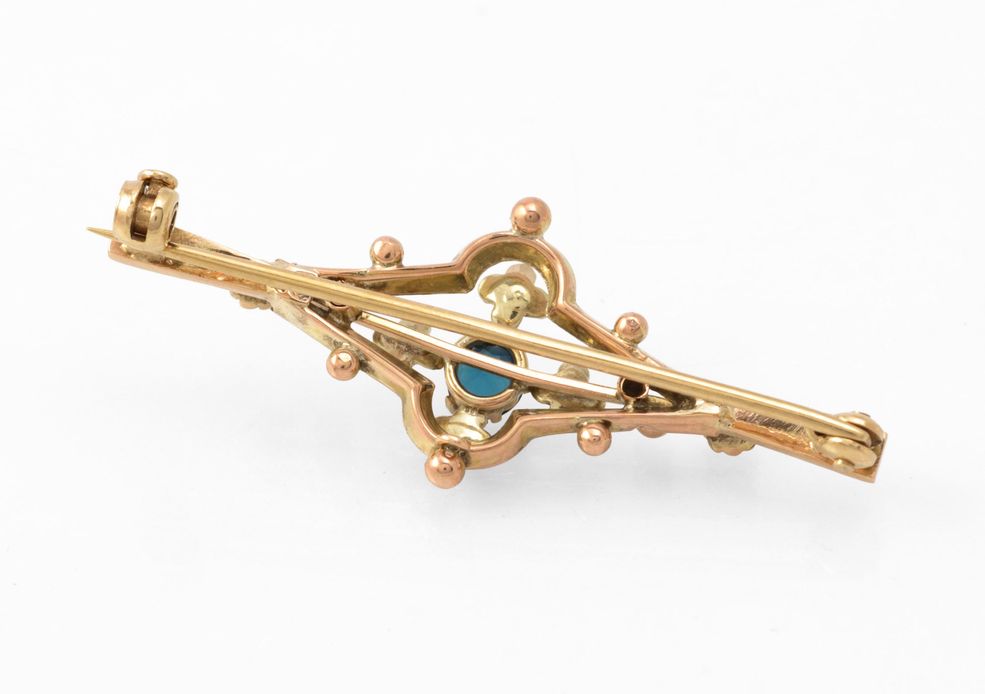 Antique 9ct gold bar brooch - reverse three-quarter view showing pin extended and safety clasp mechanism