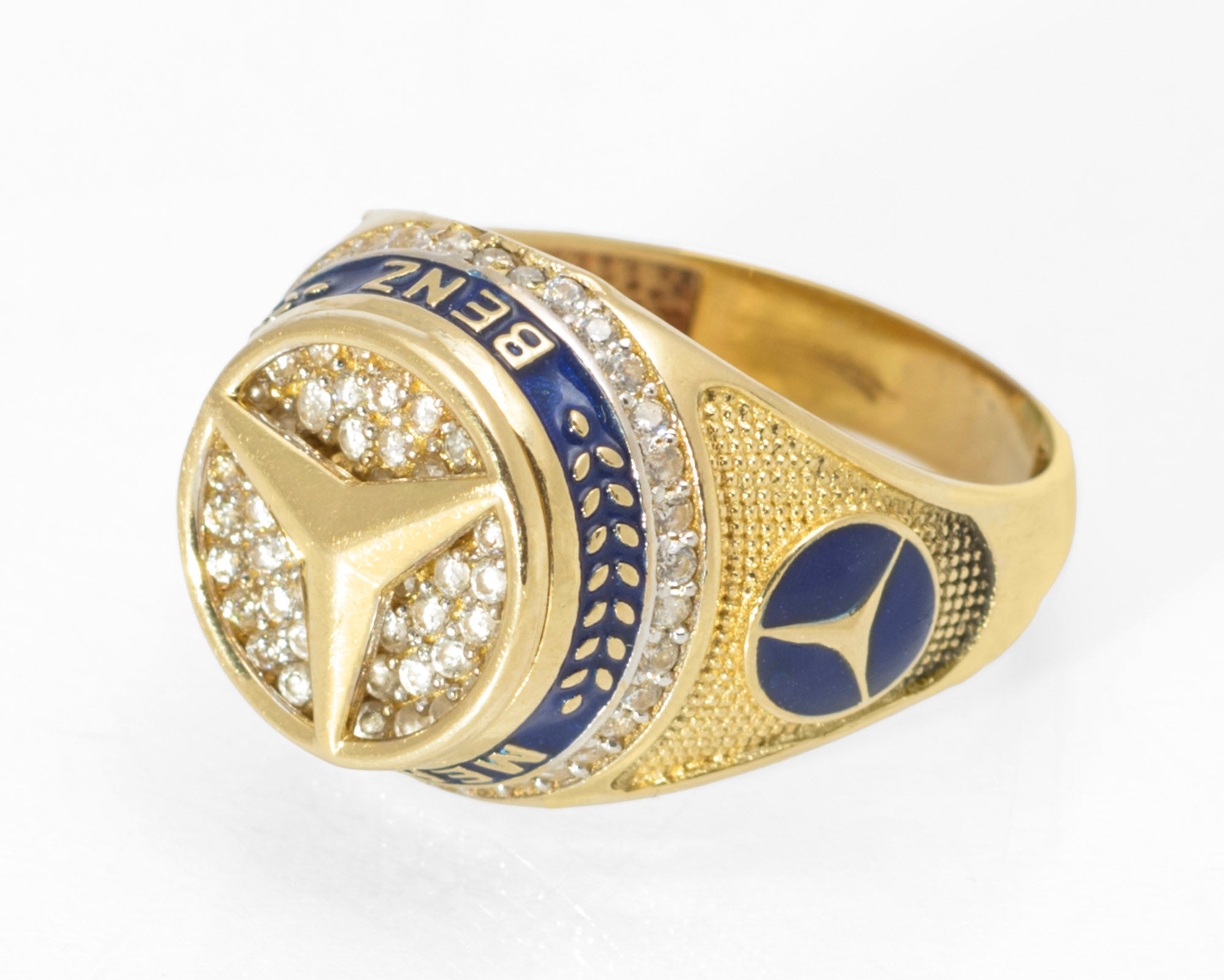14ct gold Mercedes-Benz motorsport ring - angled top view showing CZ pave and enamel band detail