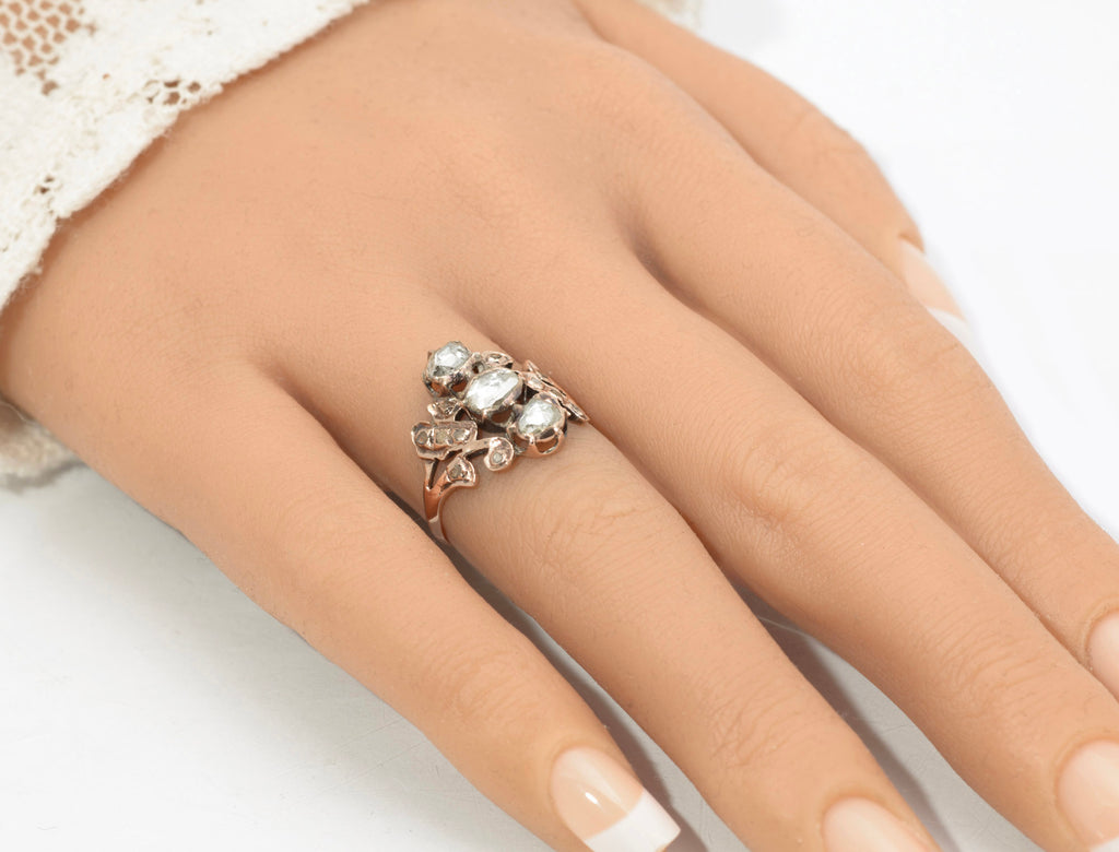 Georgian gold and diamond cluster ring - worn on hand showing scale and how the cluster sits on the finger