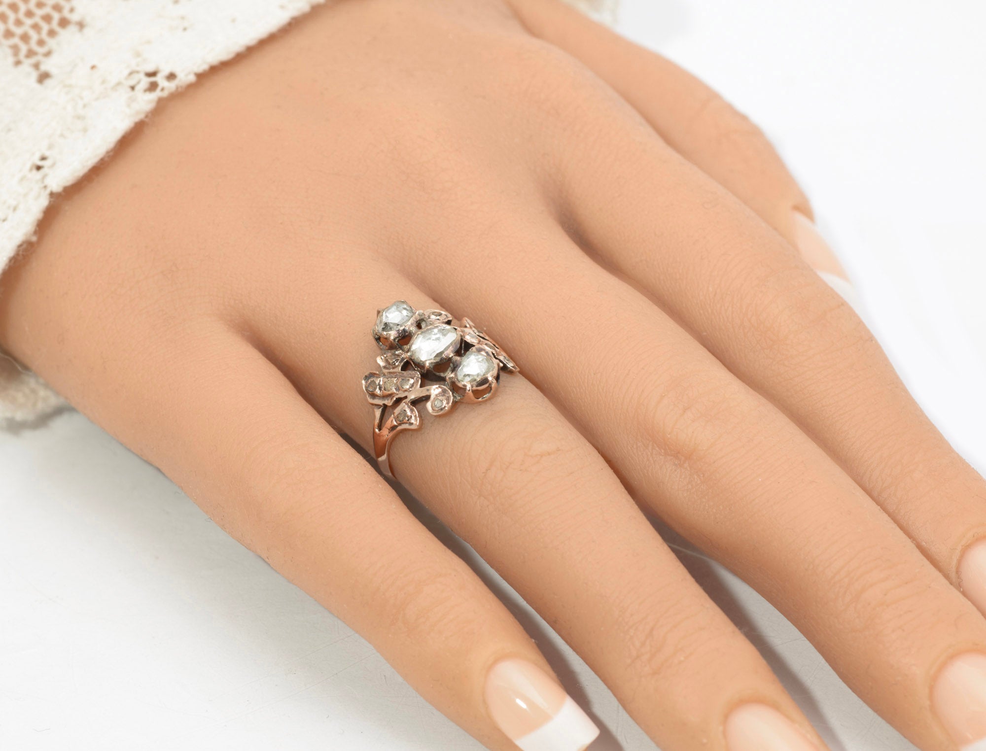 Georgian gold and diamond cluster ring - worn on hand showing scale and how the cluster sits on the finger