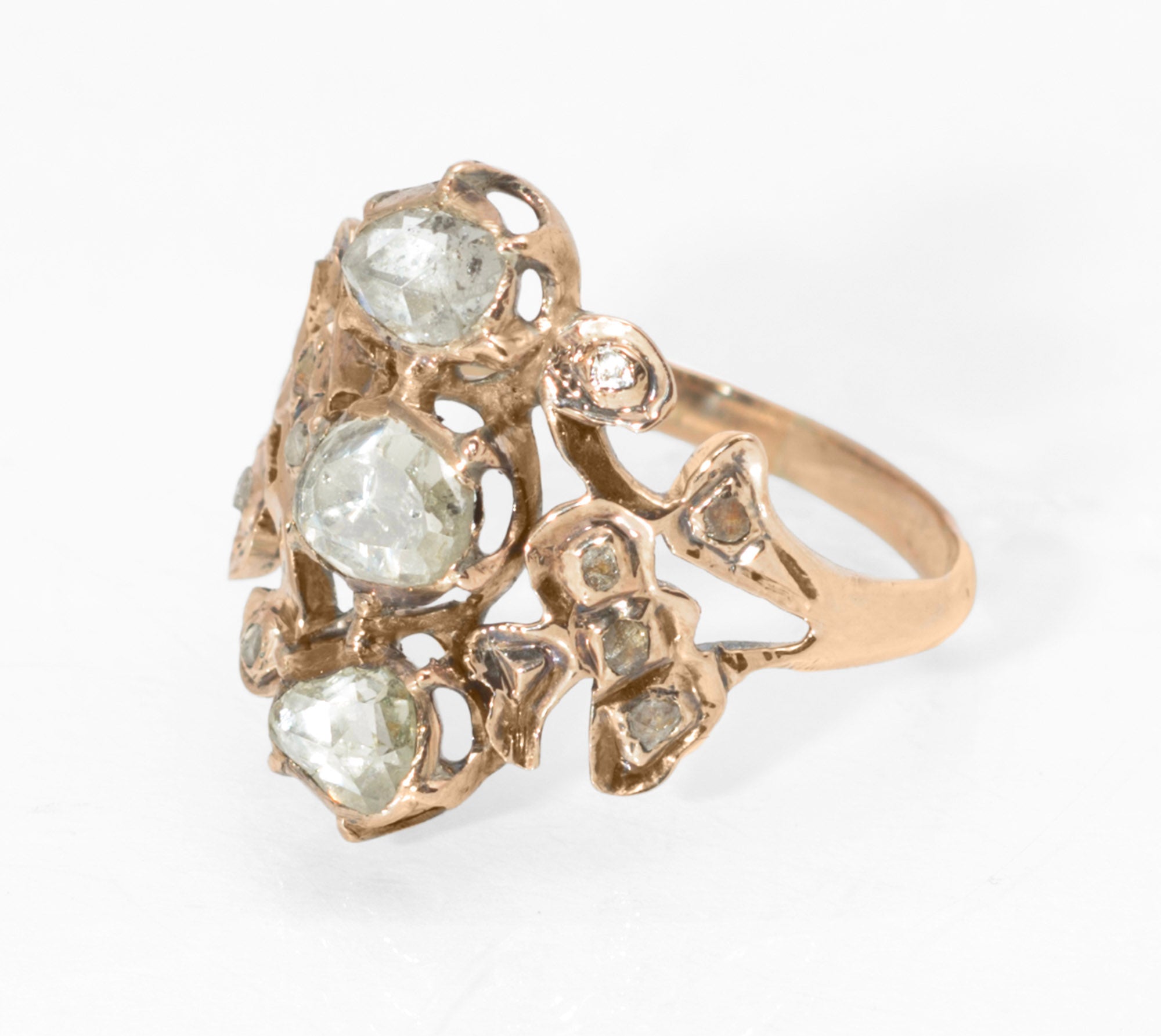 Georgian gold and diamond cluster ring - reverse showing closed foiled backs to all diamond settings and open scrolling gold mount construction