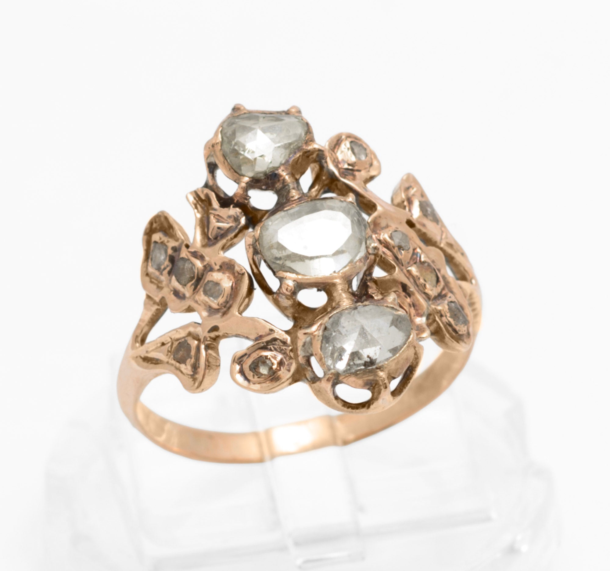 Georgian gold and diamond cluster ring - close-up of cluster showing portrait cut centre diamond and surrounding rose and mine cut stones in foiled closed back settings