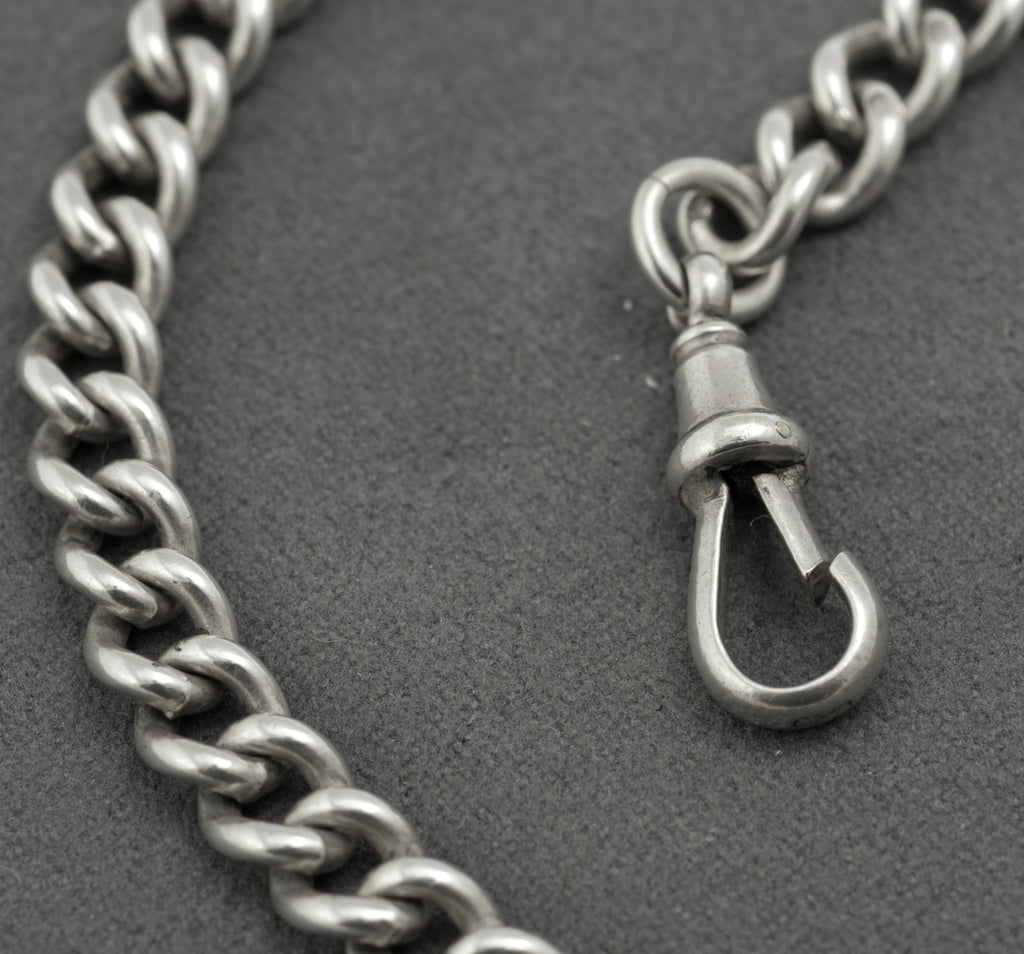 Antique sterling silver double Albert chain - close up of T-bar and dog clip junction showing sponsor's marks and graduated curb link detail