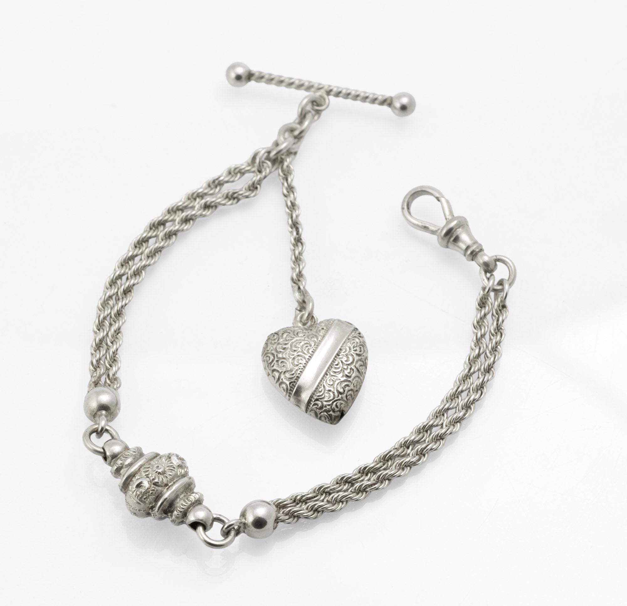 Antique Victorian sterling silver Albertina chain - alternative full view on white background showing multi-strand rope chains, ornate central feature and suspended heart fob