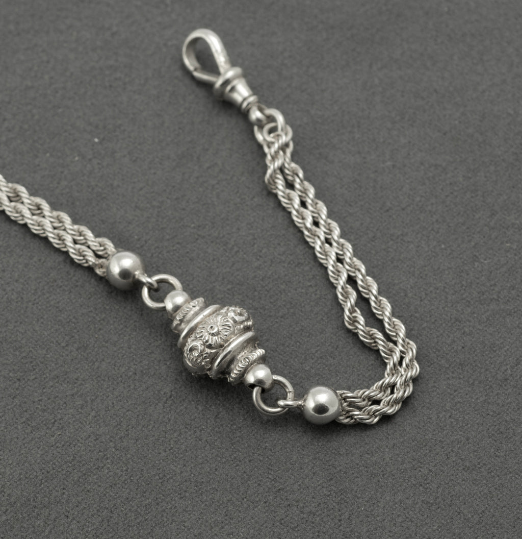 Antique Victorian sterling silver Albertina chain - close up of traditional dog clip end showing swivel fitting and multi-strand rope chain detail