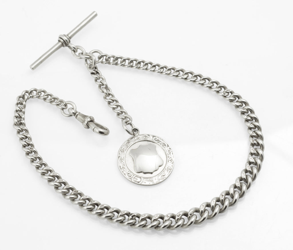 Antique Victorian sterling silver graduated Albert watch chain 1888 - full view on white background showing T-bar, dog clip and NSL Winners 1948 presentation fob reverse