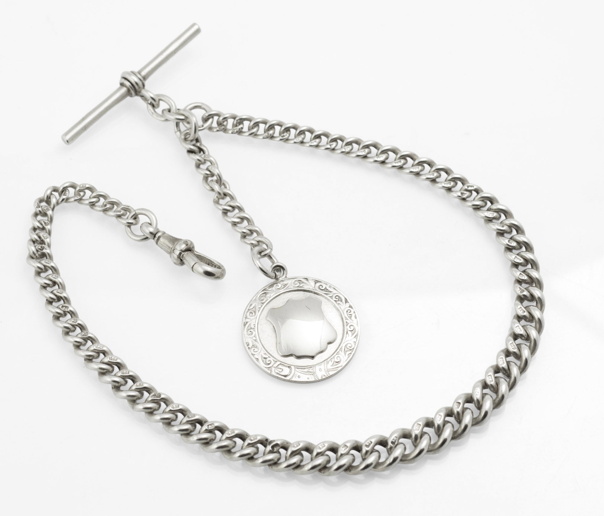 Antique Victorian sterling silver graduated Albert watch chain 1888 - full view on white background showing T-bar, dog clip and NSL Winners 1948 presentation fob reverse