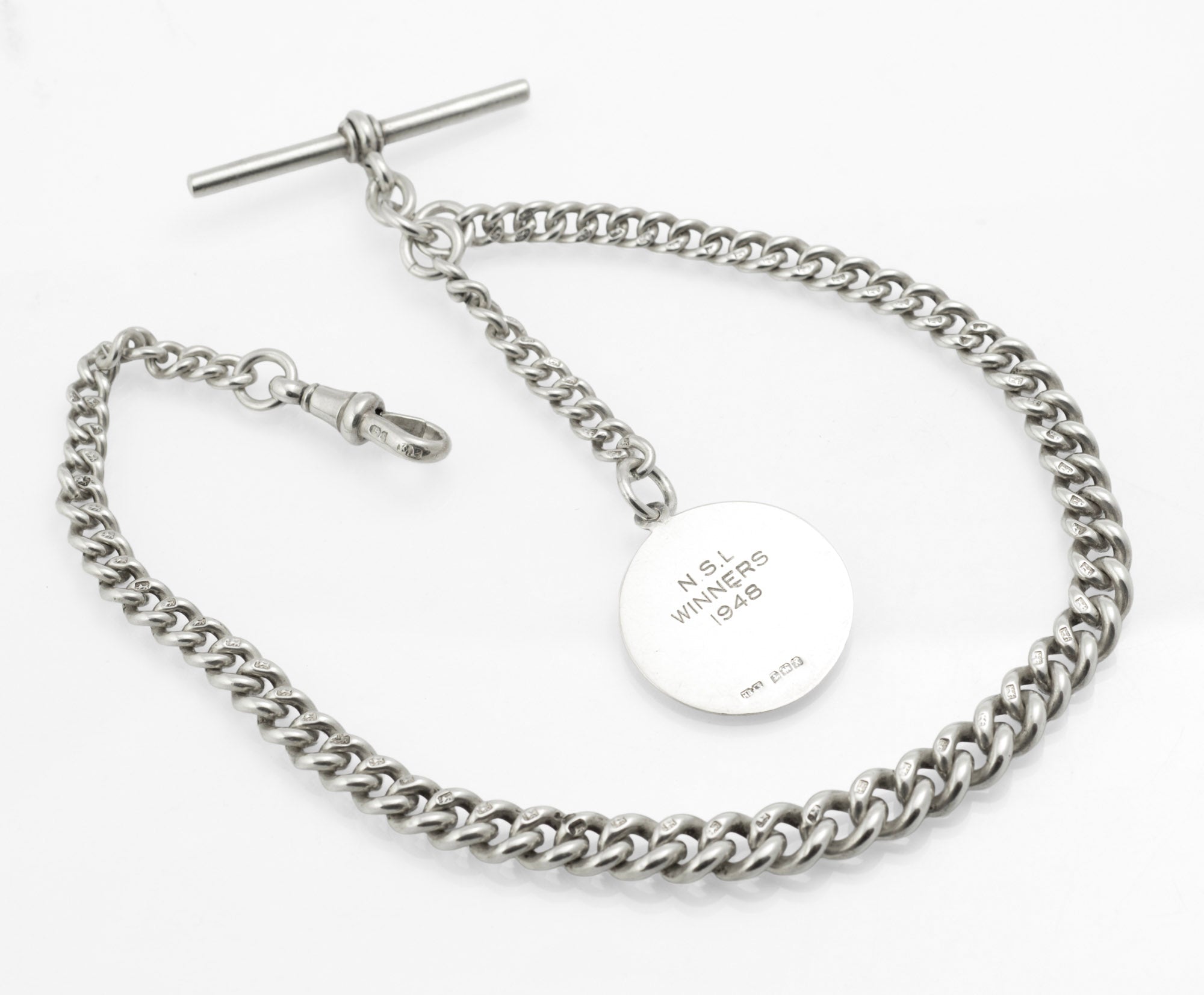 Antique Victorian sterling silver Albert chain - close up of presentation fob reverse engraved N.S.L Winners 1948 with Birmingham 1947 hallmarks below