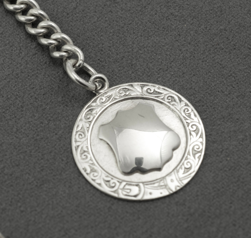 Antique Victorian sterling silver Albert chain - close up of fob reverse showing N.S.L Winners 1948 engraving and Birmingham 1947 hallmarks