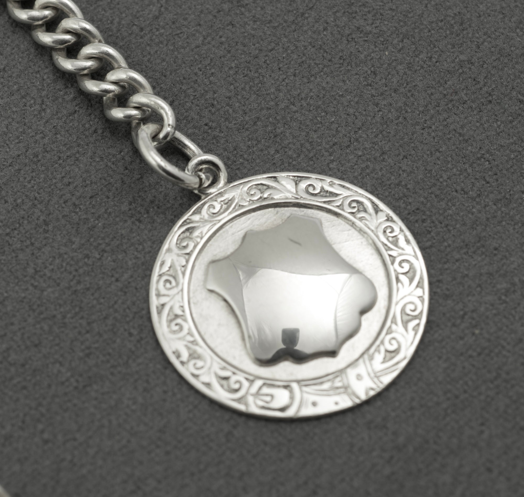 Antique Victorian sterling silver Albert chain - close up of fob reverse showing N.S.L Winners 1948 engraving and Birmingham 1947 hallmarks