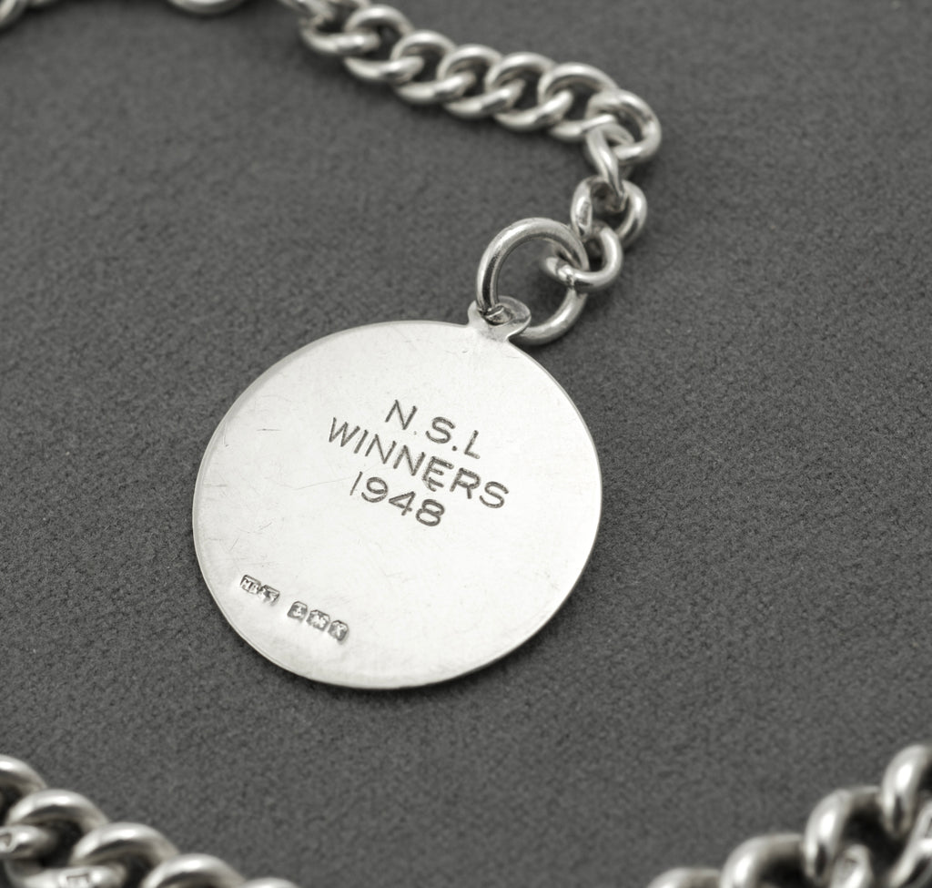 Antique Victorian sterling silver Albert chain - full view showing chain configured as necklace with T-bar and NSL Winners 1948 fob suspended from central section