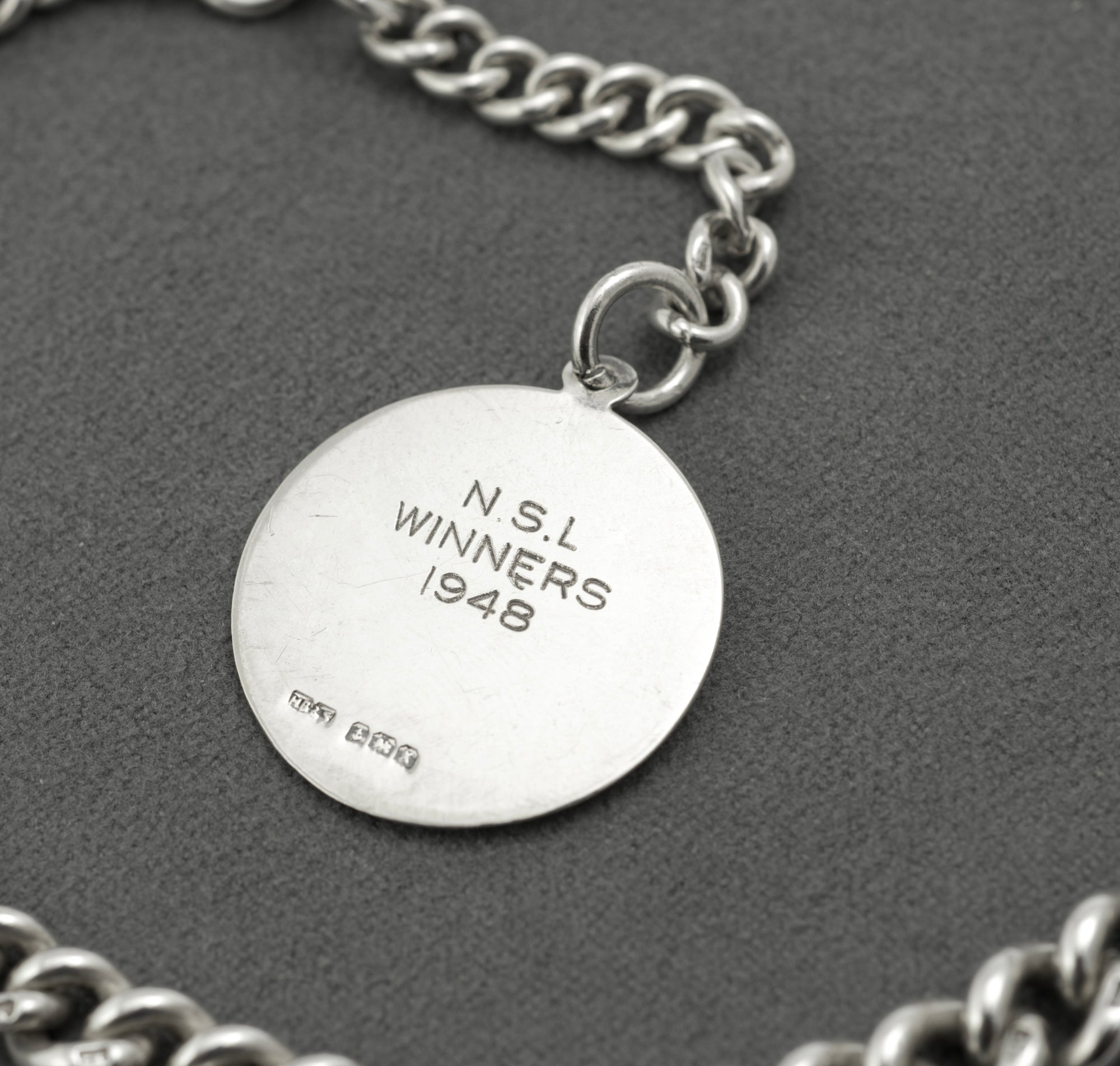 Antique Victorian sterling silver Albert chain - full view showing chain configured as necklace with T-bar and NSL Winners 1948 fob suspended from central section