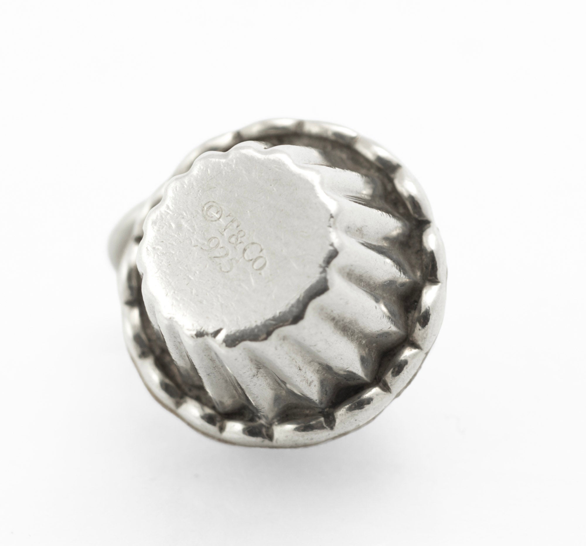Vintage Tiffany & Co. sterling silver cupcake charm - underside view showing T&Co. 925 stamp confirming Tiffany & Co. and sterling silver