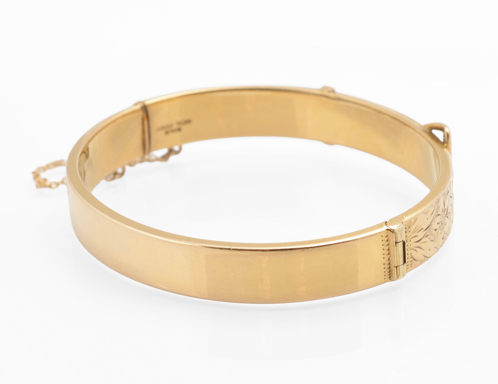 Edwardian gold metal cored buckle bangle - open view showing concealed box clasp mechanism and interior with GOLD METAL CORED mark