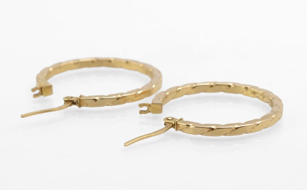 Vintage 9ct gold Unoaerre hoop earrings - front view showing both hoops closed with lever fittings secured