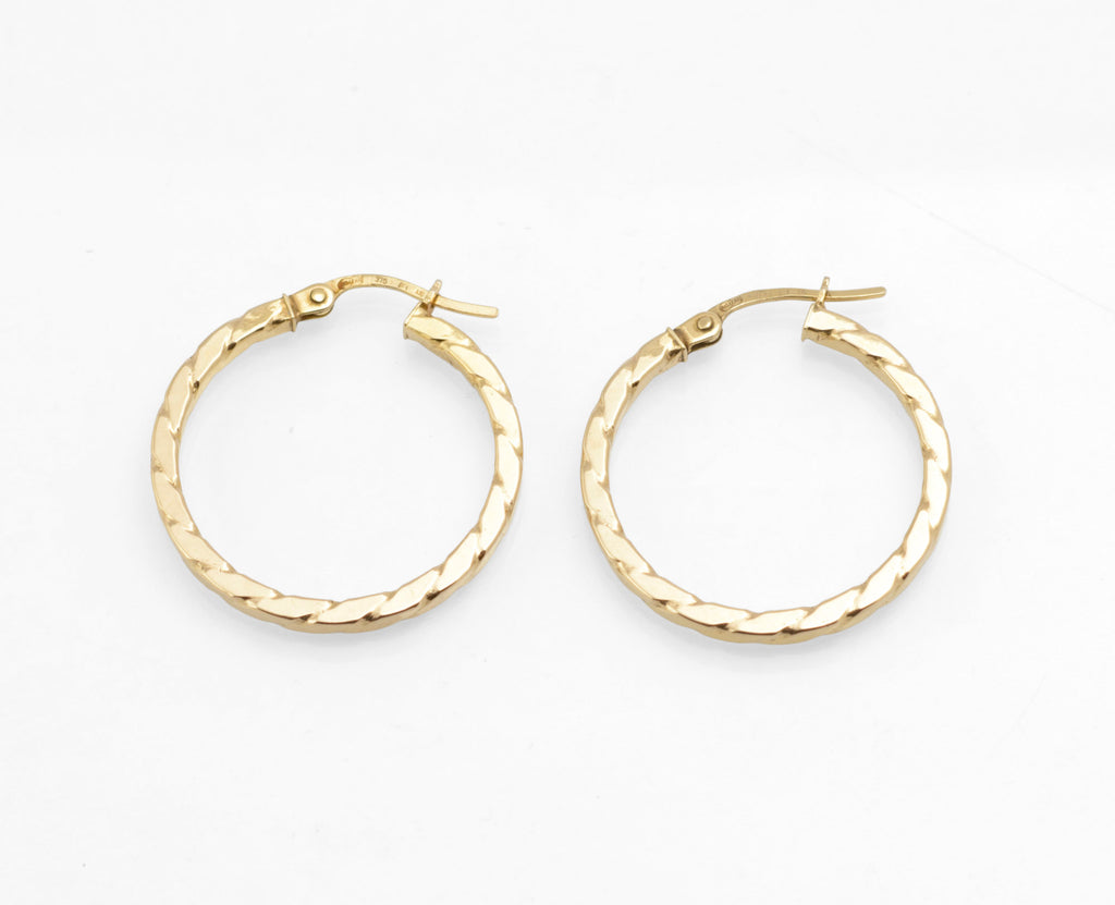 Vintage 9ct gold Unoaerre hoop earrings - close up of lever showing Birmingham international convention hallmarks confirming 9ct gold