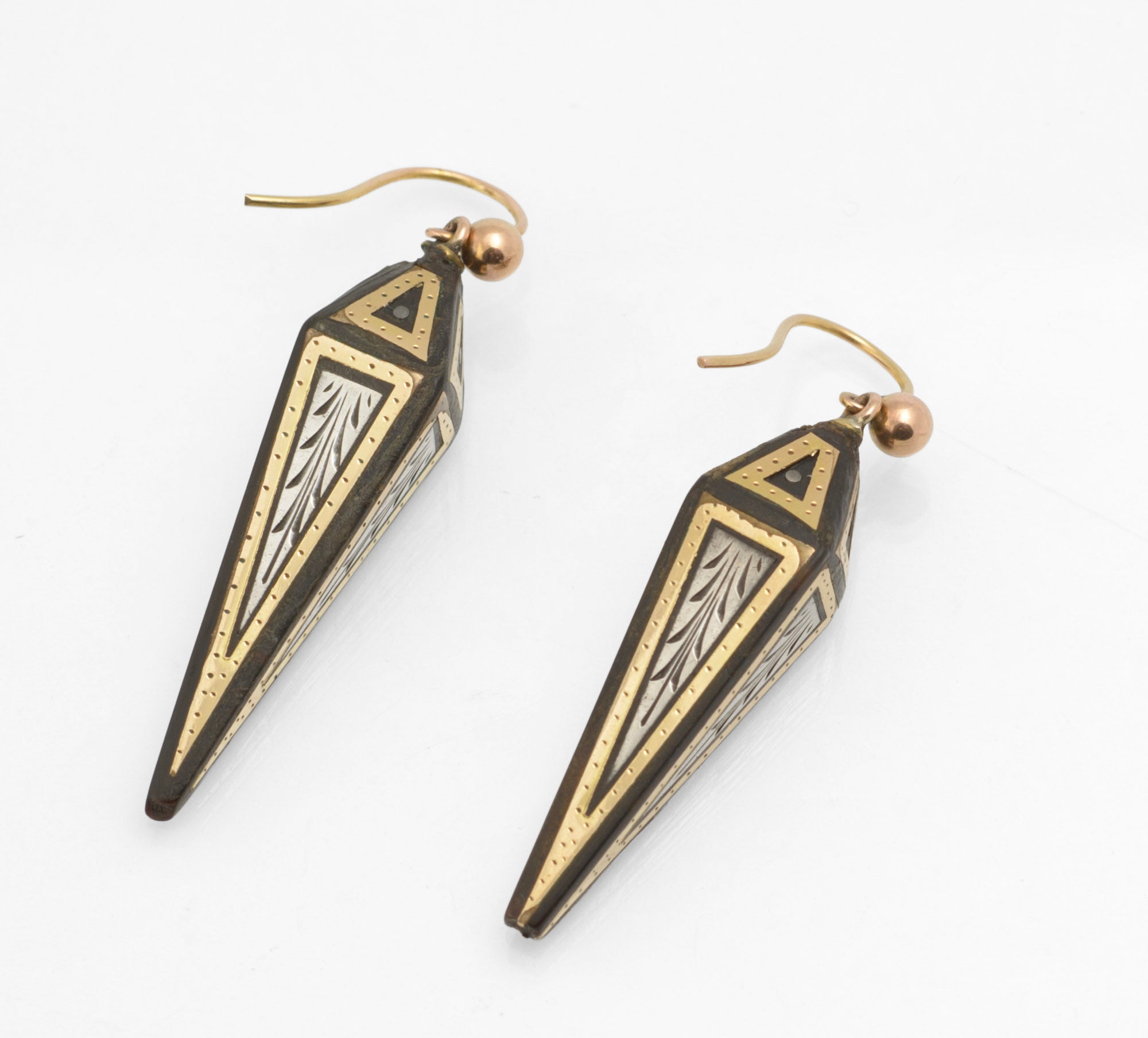 Antique Victorian piqué work earrings - alternative front view showing gold dotted detailing and triangular shoulder decoration on dark ram's horn