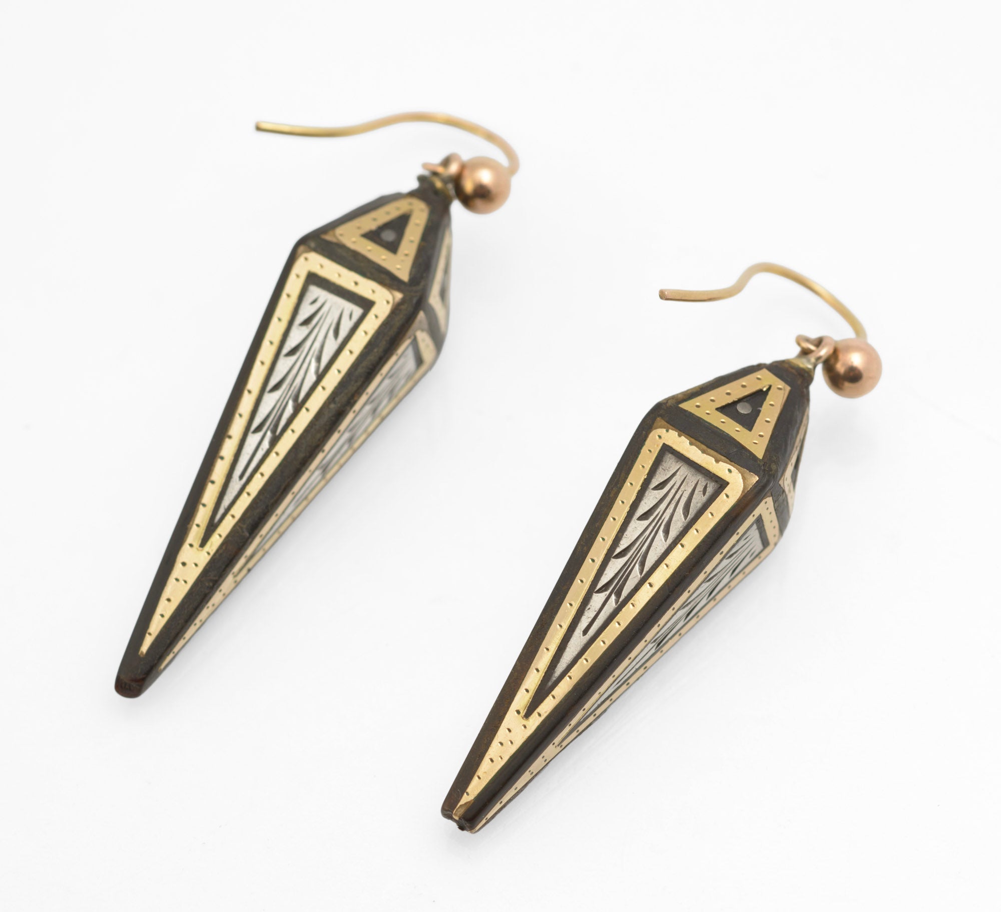 Antique Victorian piqué work earrings - three quarter view showing faceted sides and 15ct gold spherical ball fittings on curved ear wires