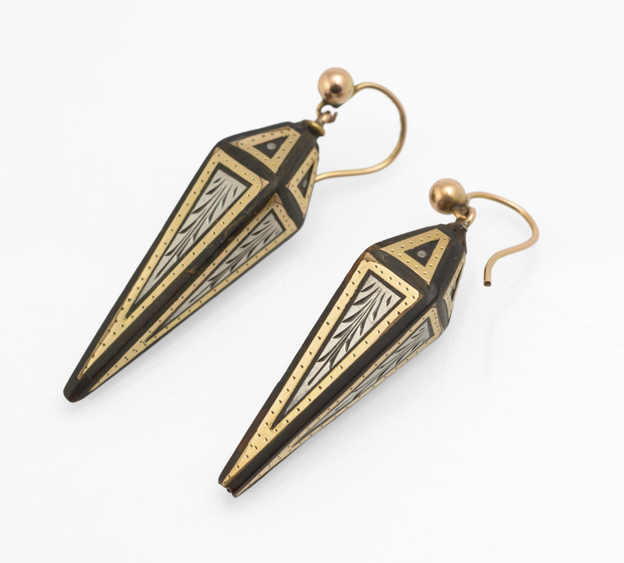 Antique Victorian piqué work earrings - reverse side view showing gold and silver inlay detail on faceted ram's horn drops