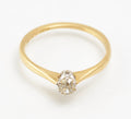 An antique 1920s diamond solitaire ring in 18ct yellow gold and platinum.