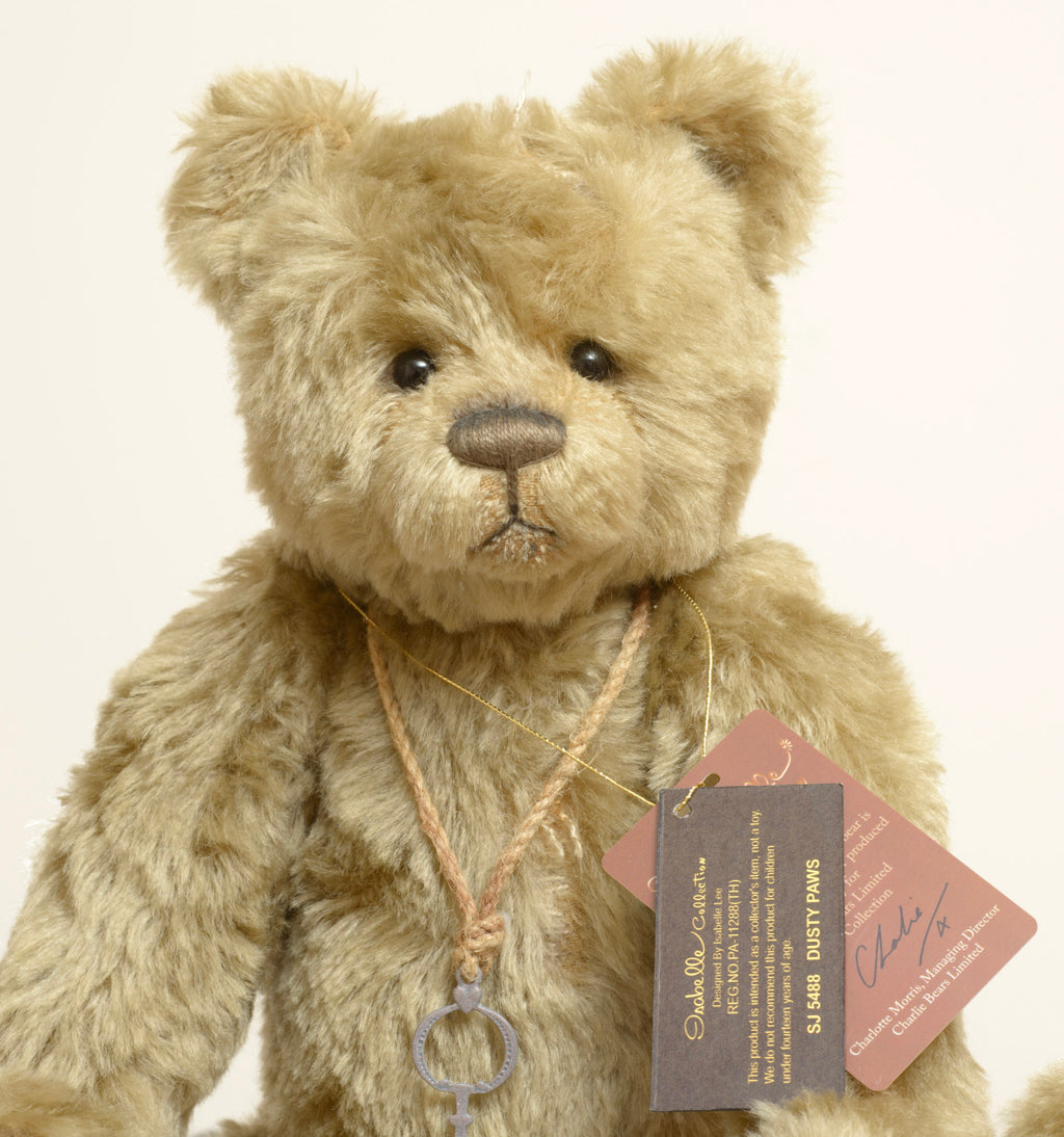 Charlie Bears Dusty Paws - Isabelle Collection - swing tag reverse showing SJ 5488 Dusty Paws name and Isabelle Collection branding