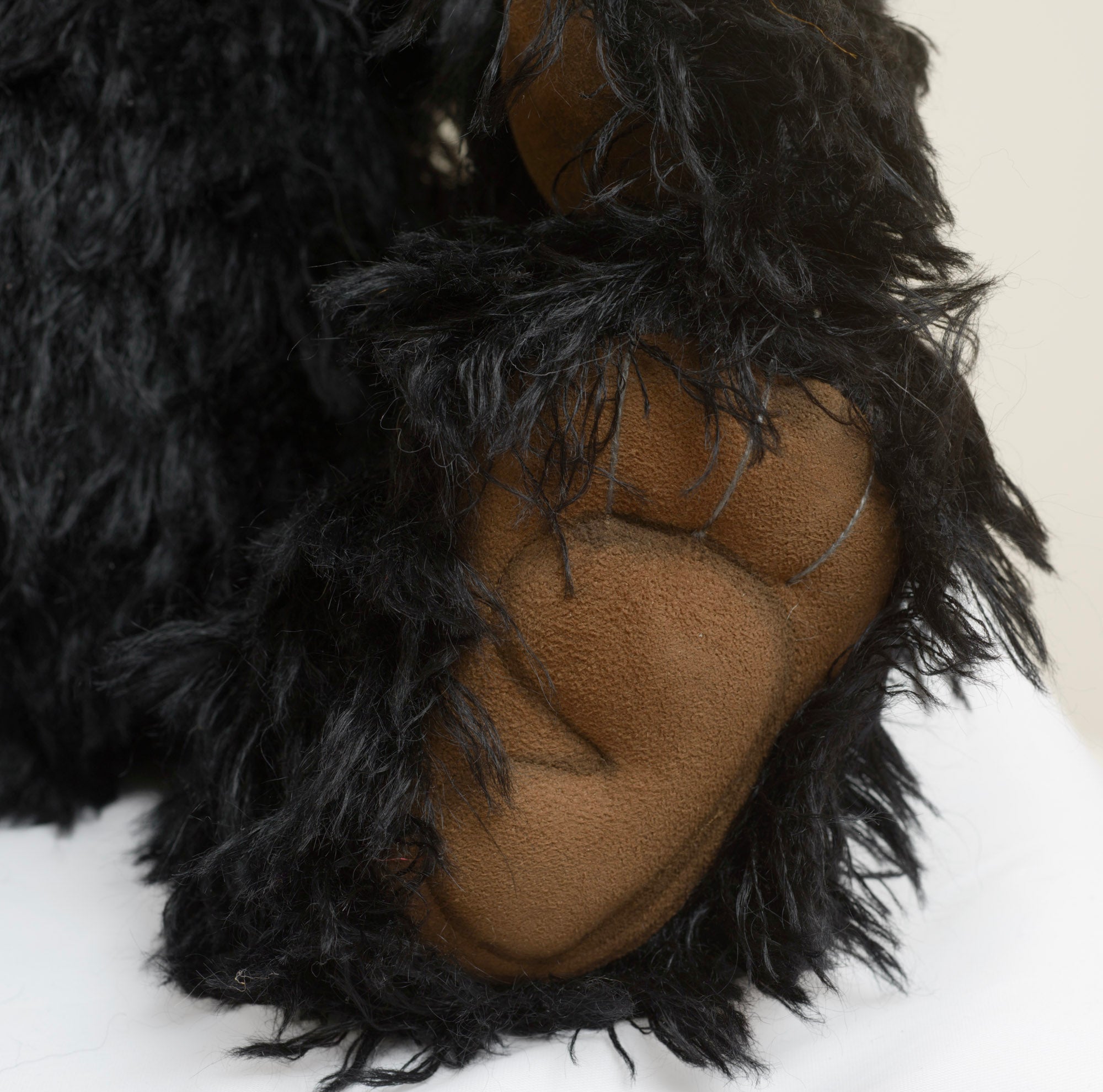 Charlie Bears Indigo - Isabelle Collection - close up face showing dark glass eyes and hand-stitched black nose in dense black mohair