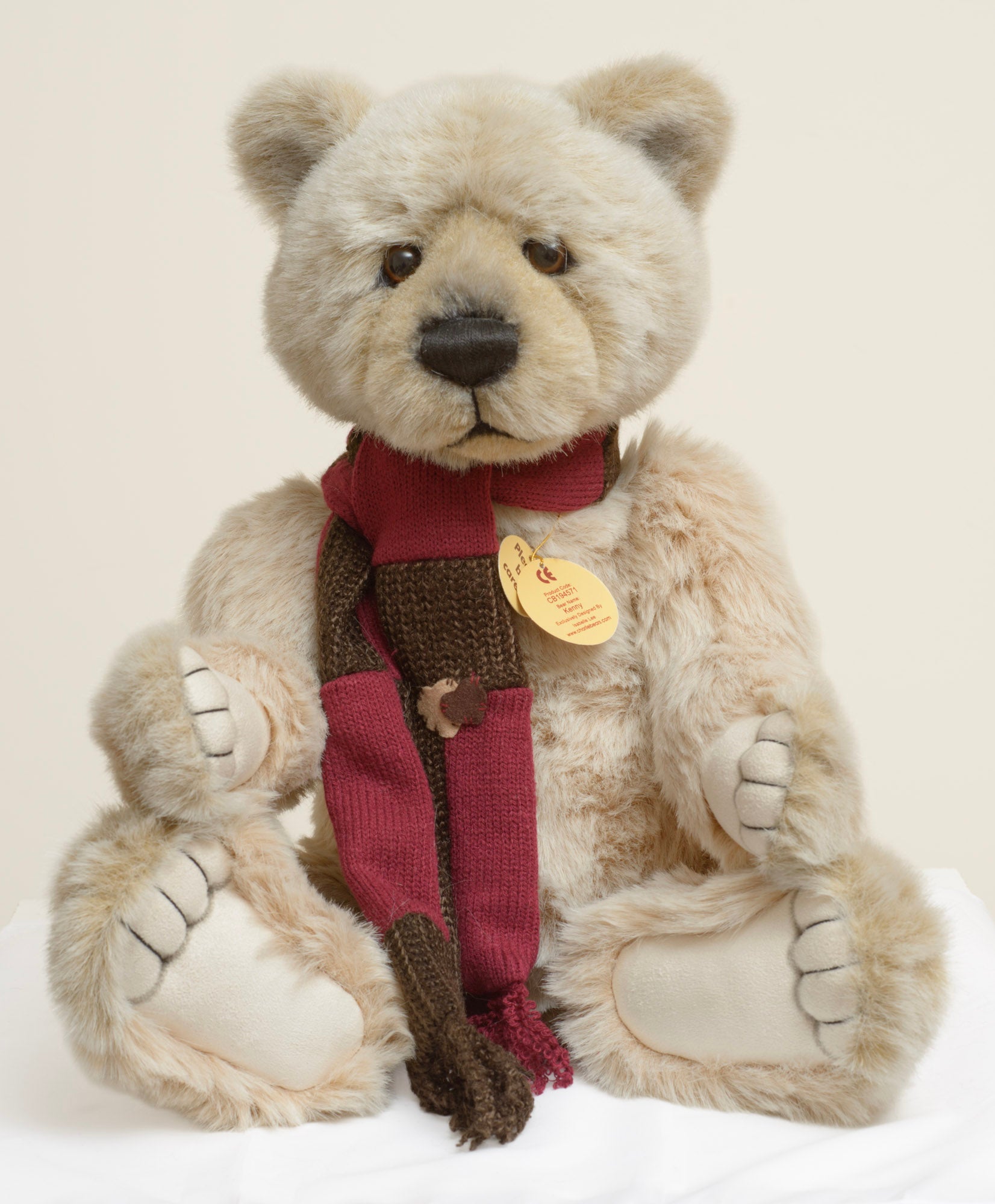 Charlie Bears Kenny - Isabelle Collection - rear view showing sandy-cream plush coat and Charlie Bears woven label sewn to lower back