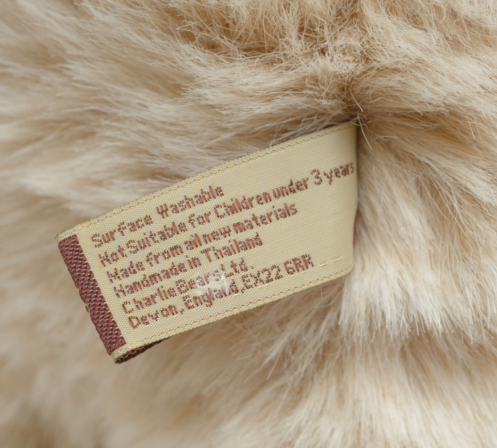 Charlie Bears Kenny - Isabelle Collection - swing tag showing product code CB194571, bear name Kenny, exclusively designed by Isabelle Lee